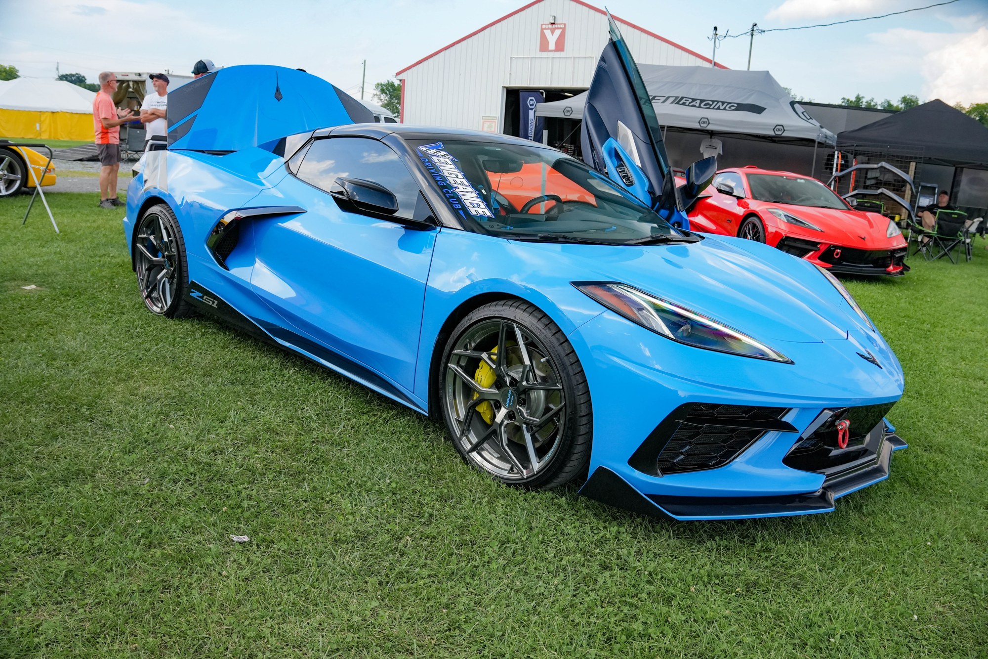 Blue Corvette with doors open