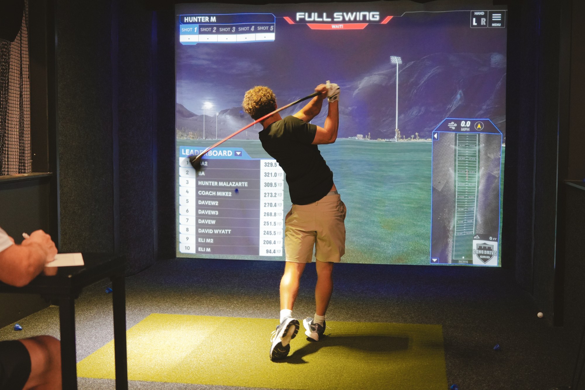 Golf simulator action