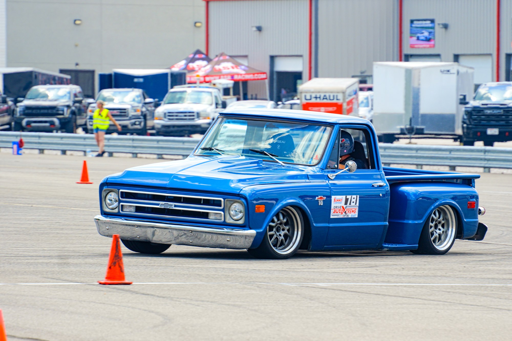 Blue pickup in autocross action